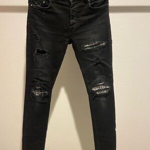 AMIRI Black Distressed Skinny Jeans